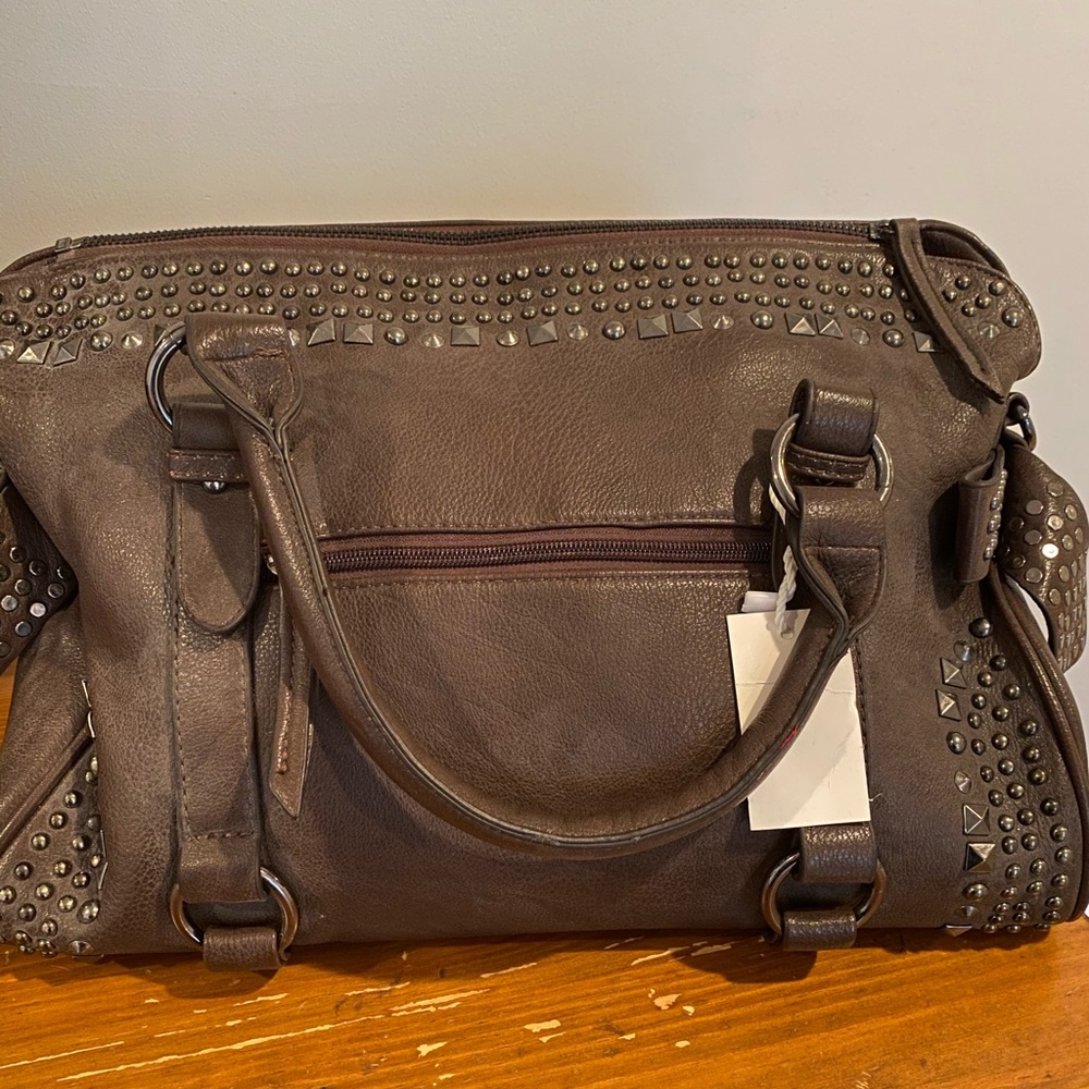 Studded brown leather bag
